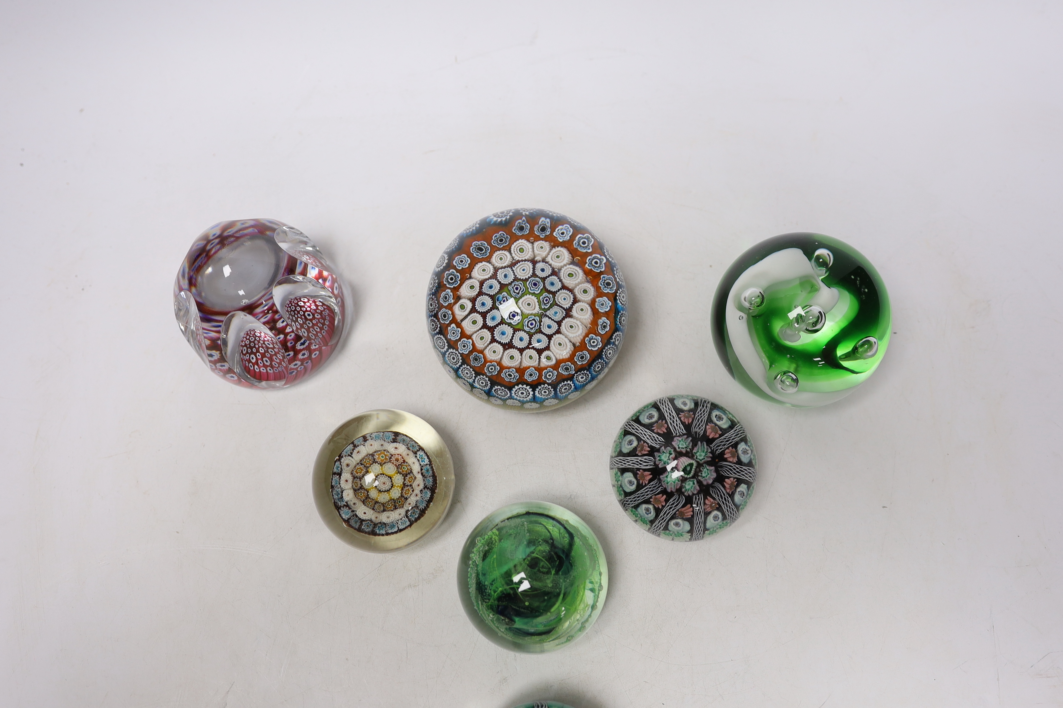 Seven Whitefriars and other paperweights, largest 8cm wide